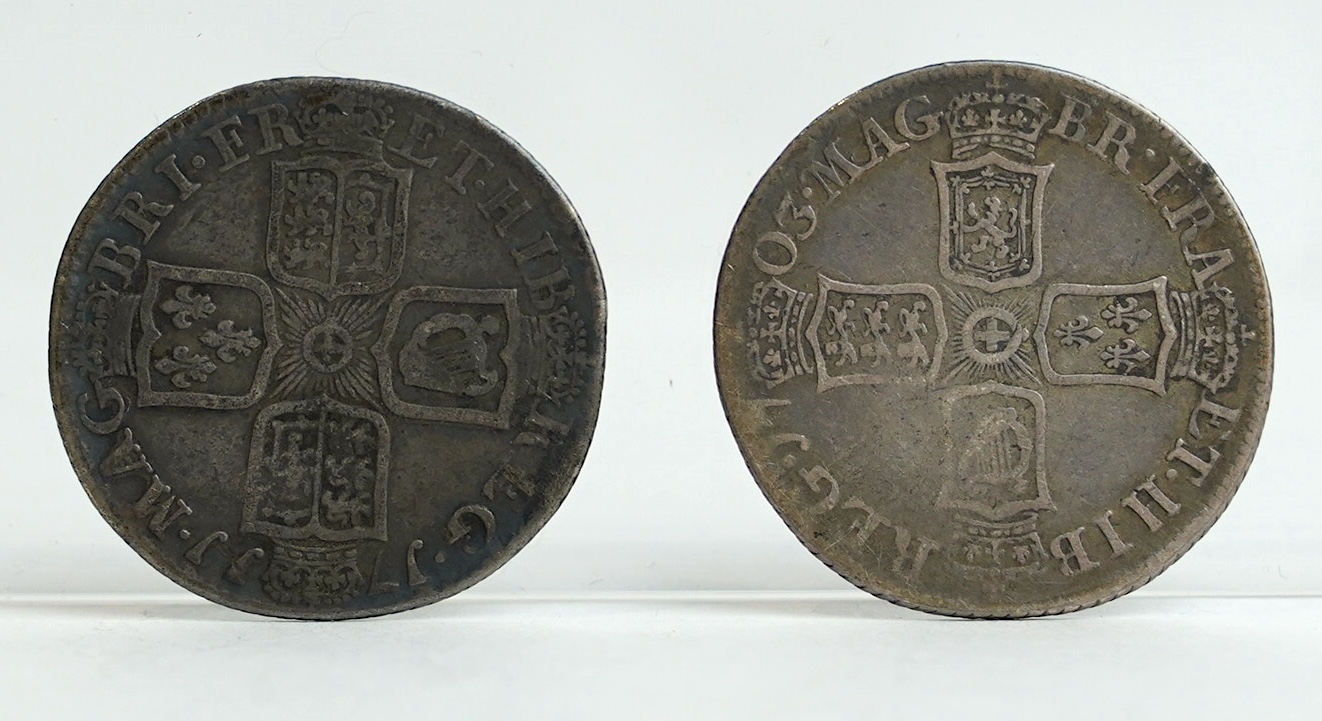 British silver coins, Anne (1702-1714), shilling, 1711 (S3618), good fine and shilling 1703 VIGO (S3586), VG or better (2)